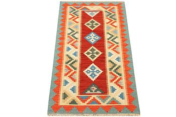 A Kilim runner carpet, c. 196 x 88 cm.