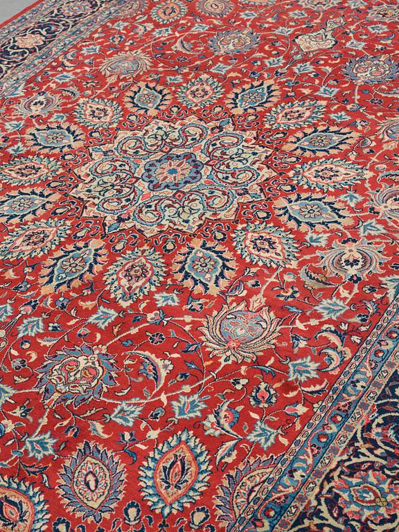 A carpet, a semi-antique/an old Persian, probably a Qazvin, ca 345-349 x 251,5-253 cm.