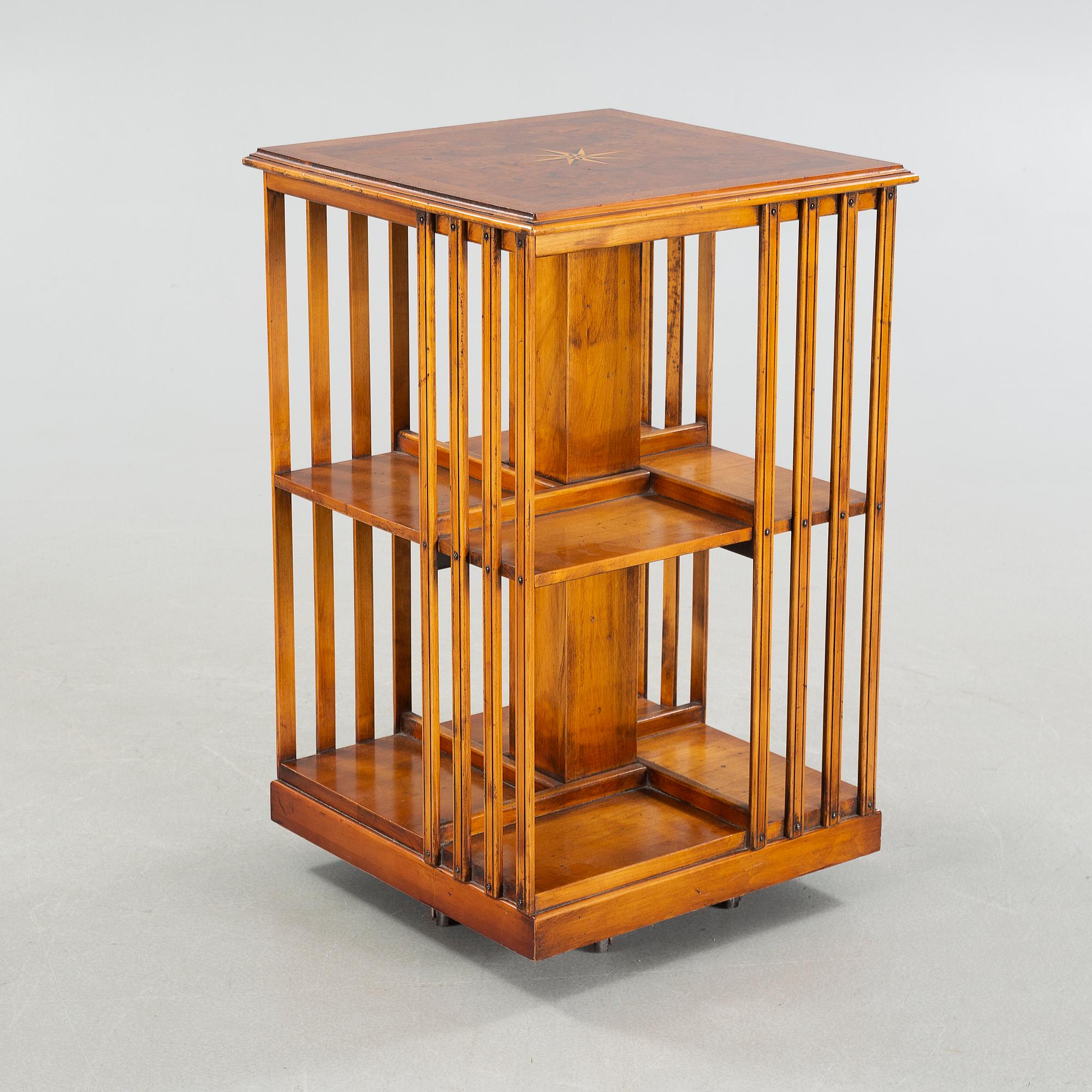 A circa mid 20th century turning book case.