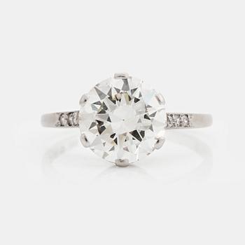 454. A platinum ring set with an old-cut diamond weight ca 3.50 cts quality ca I/J si.