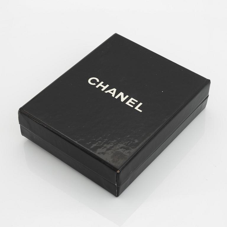 Chanel, a pair on gold tone and pearl clip-on earrings.