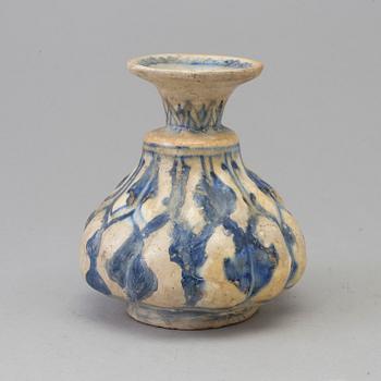 A 13th century persian pottery vase.