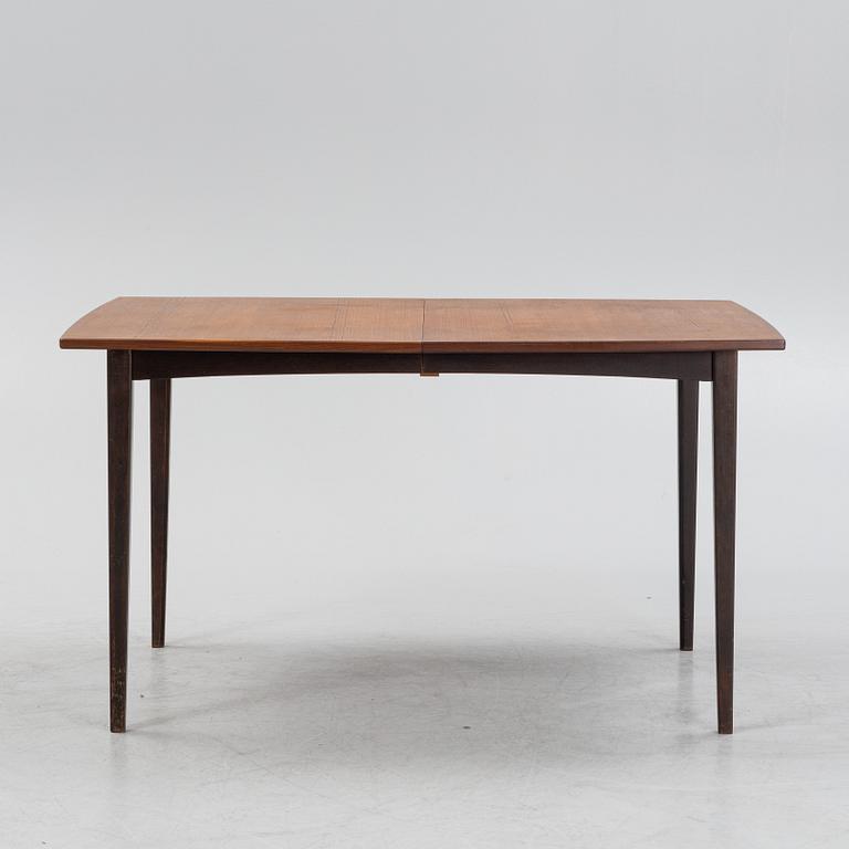 A teak dining table, mid 20th Century.
