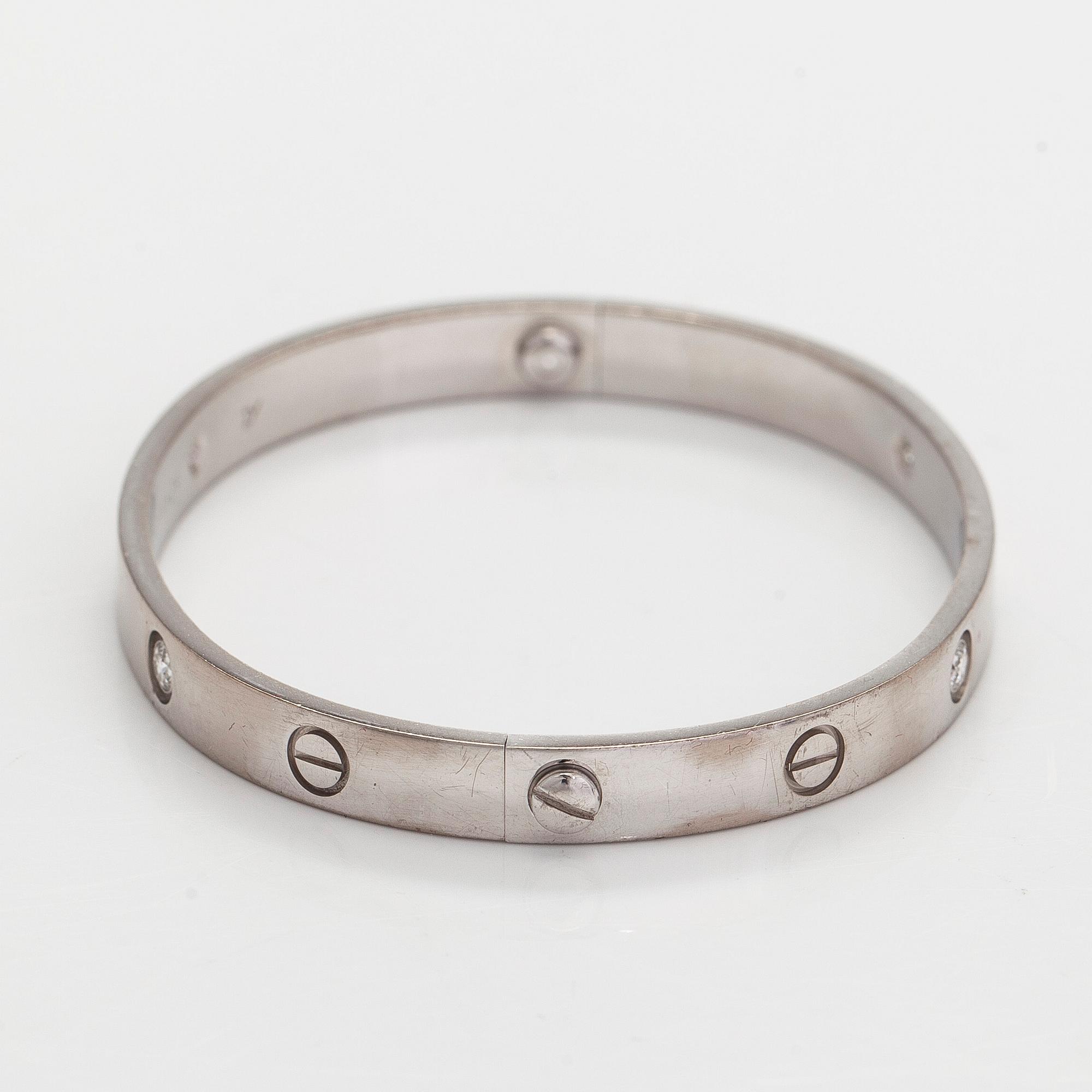 Cartier, rannekoru "Love", 18K valkokultaa, briljanttihiottuja timantteja.