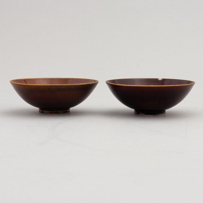 Stig Lindberg, a vase and a pair of glazed stone ware bowls, Gustavsberg studio,