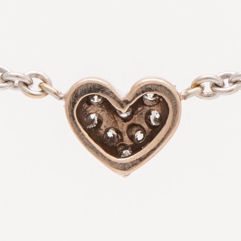 Lynggaard pendant on cjain, 18k whitegold brilliant-cut diamonds 0,08 ct, width heart approx 5 mm, length 40 cm, dustbag.