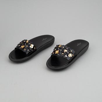 Louis Vuitton, a pair of sandals, size 40.