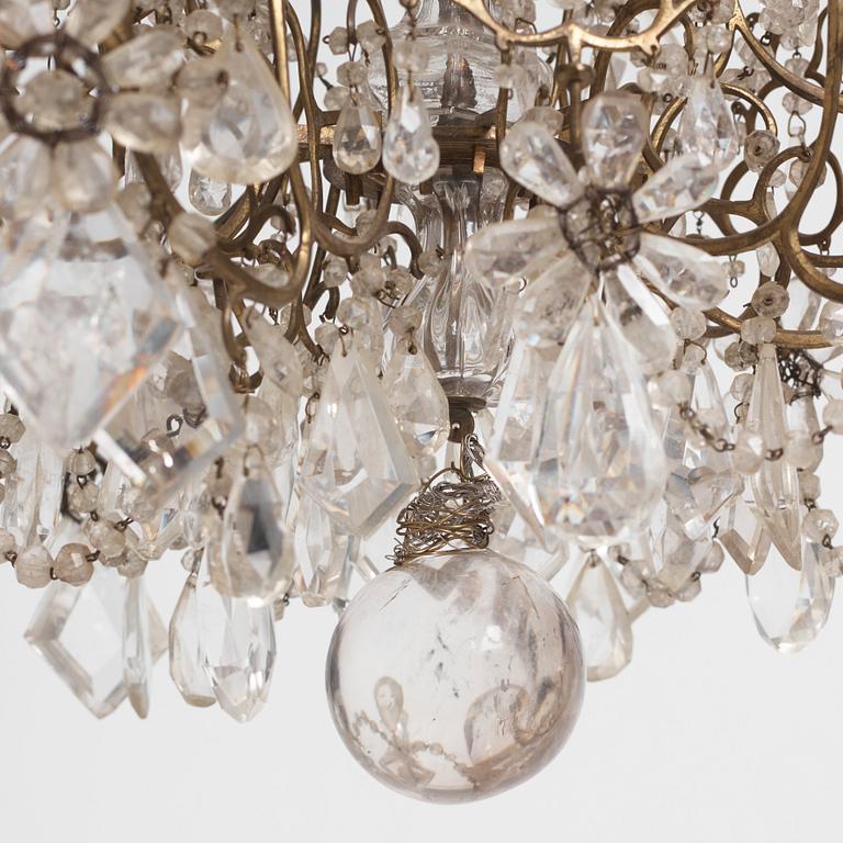 A presumably Italian Baroque and Baroque-style rock crystal and cut-glass six-branch chandelier, 18th century and later.