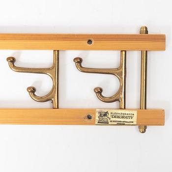 A set of three 'Decorative' coat hangers, Skoglunds metallgjuteri, Anderstorp, 1950s/60s.