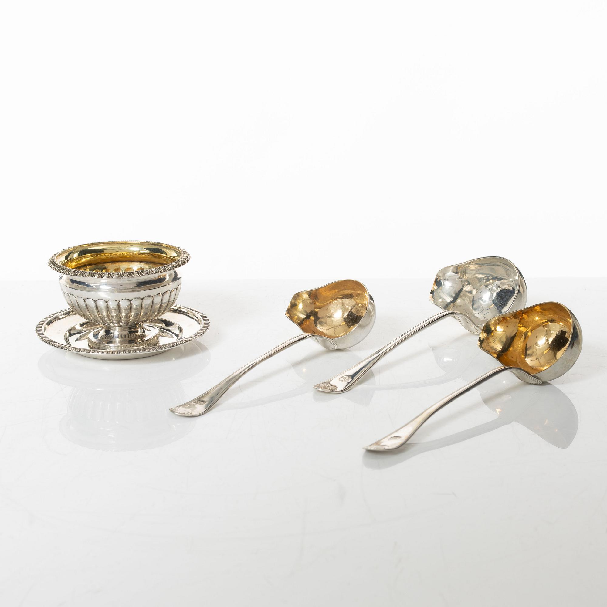 A set of three Swedish silver sauce ladles and a small sauce bowl, mark of Johan Petter Grönwall,  Stockholm 1824-37.