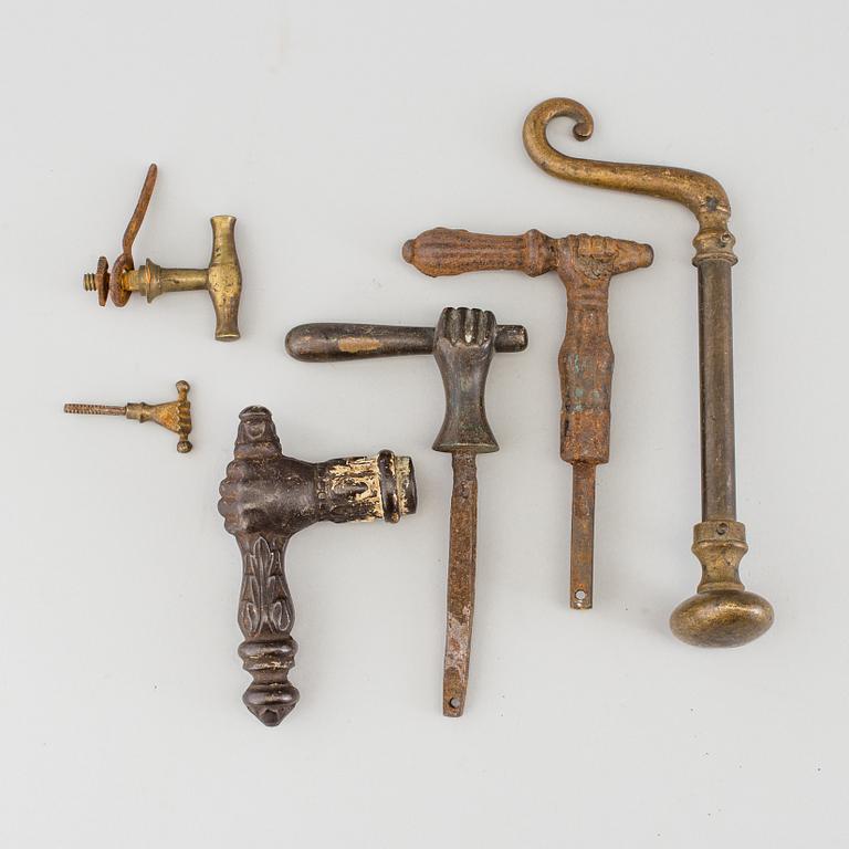 SIX DIFFERENT BRONZE DOOR HANDLES, 19th century.