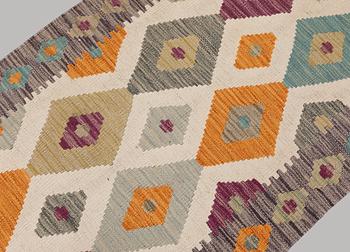 A Kilim runner, approx. 291 x 70 cm.