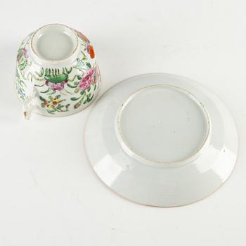 A Canton porcelain teapot and cup with saucer, China, 20th century.