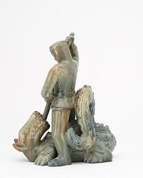 A Gunnar Nylund stoneware sculpture of S:t Michael and the dragon, Rörstrand.