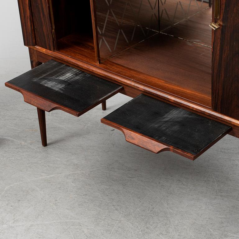 KURT ØSTERVIG, a rosewood veneered drinks cabinet, Denmerk, 1960's.