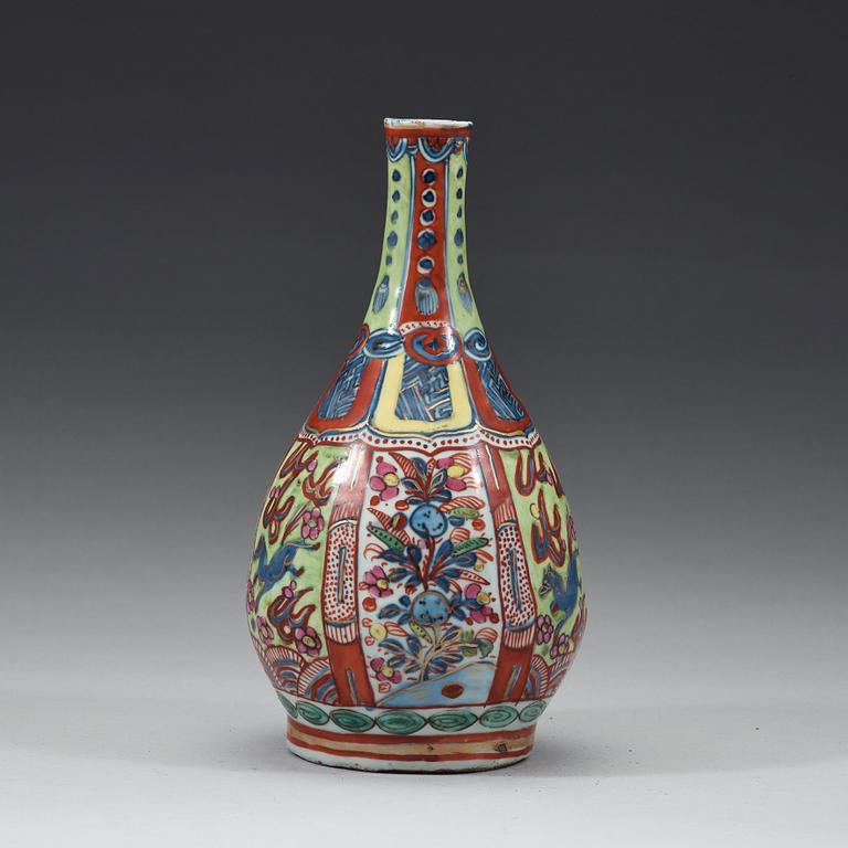 A 'clobbered' bottle vase, Ming dynasty, Wanli (1572-1620).