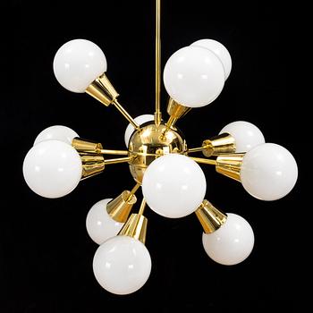 a brass and glas "Sputnik"-model ceiling light from the second half of the 20th century. Height ca 100 cm.