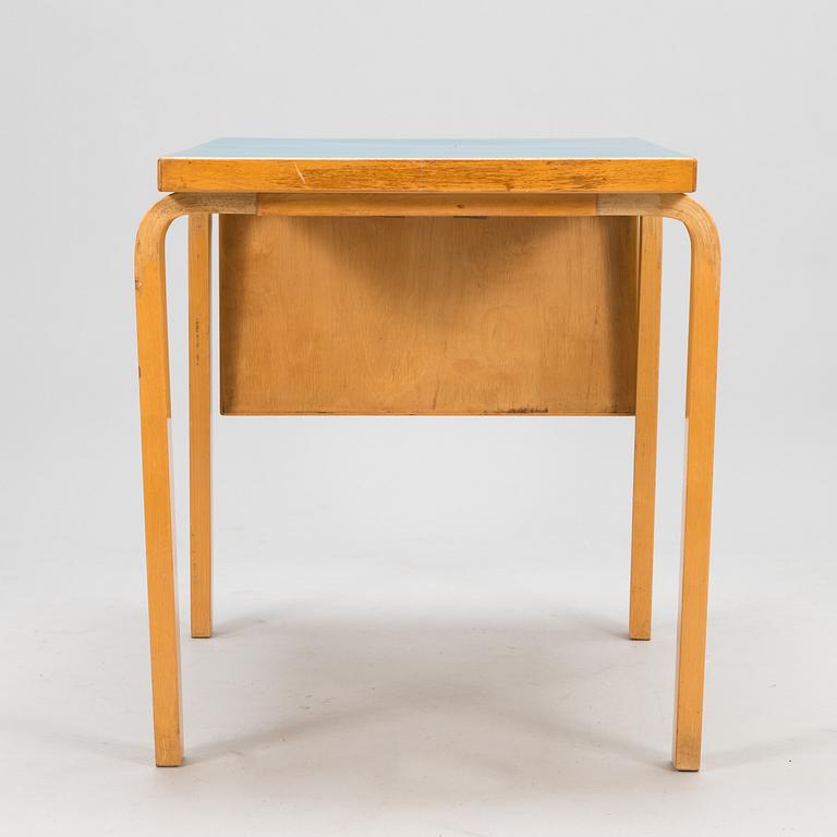 ALVAR AALTO, A mid-20th century drop leaf table for Artek Finland.