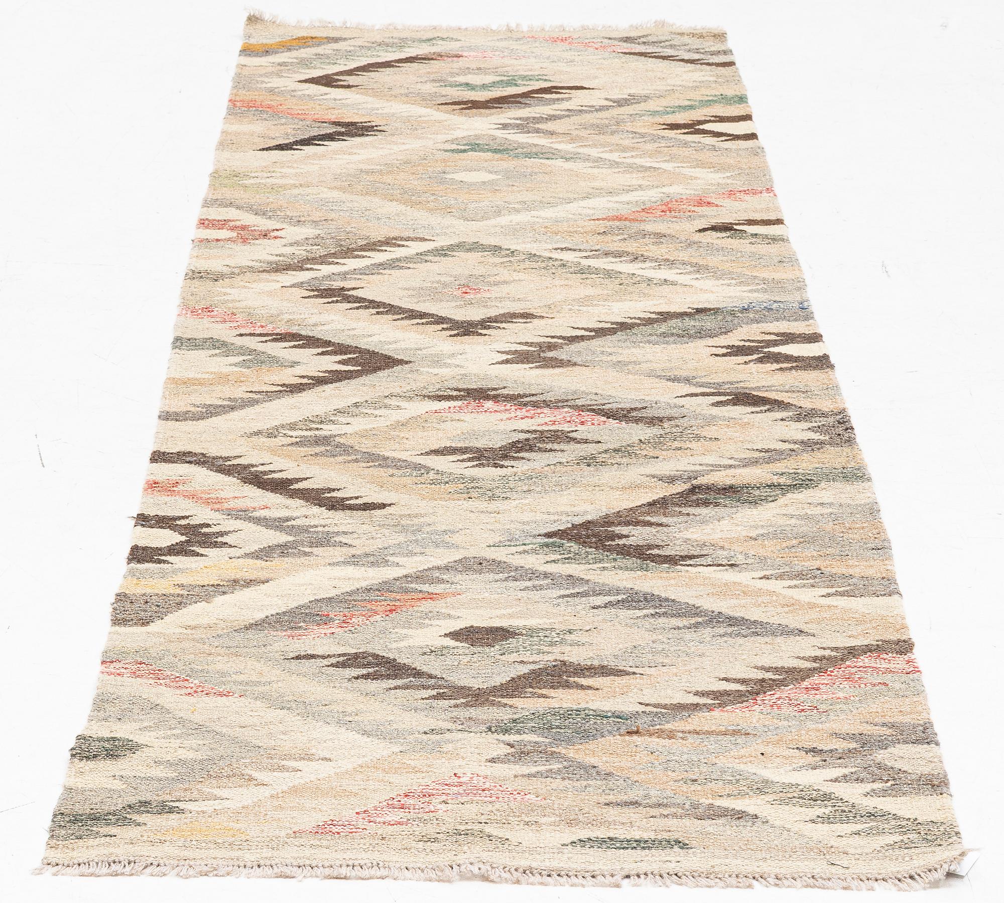 A Kilim runner, c. 290 x 80 cm.
