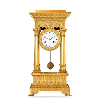 128. An Empire ormolu portico mantel clock for the Turkish market, first part of the 19th century.