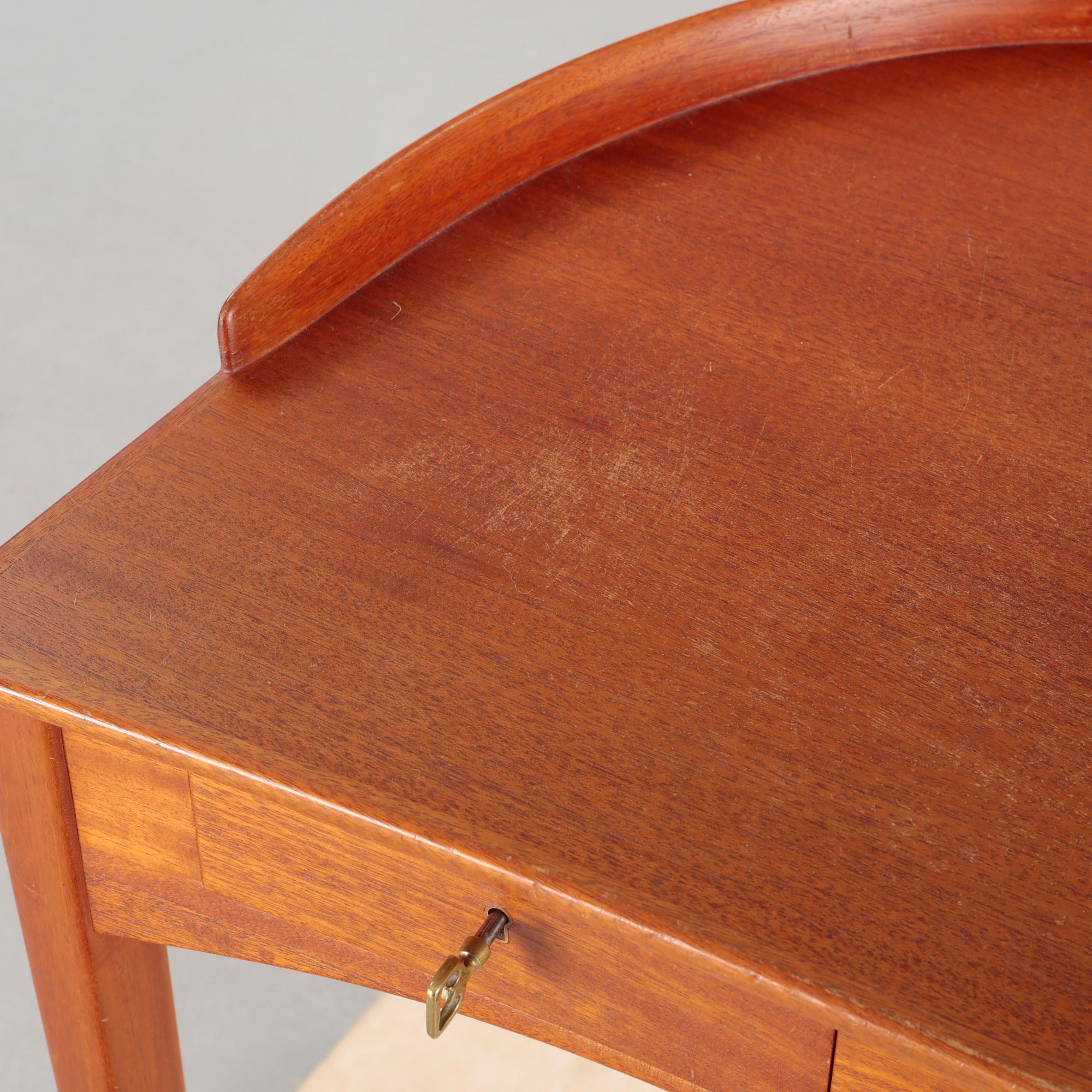 a table with mirror "Birgitta" veneered with teak designed by Carl Malmsten for Bodafors Möbelfabrik,