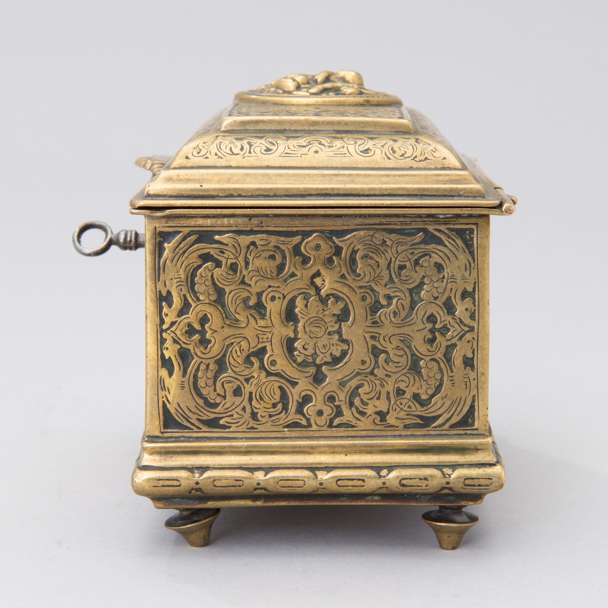 A Renaissance style brass box, Adolf Frankau & Co, London, from the late 19th century.