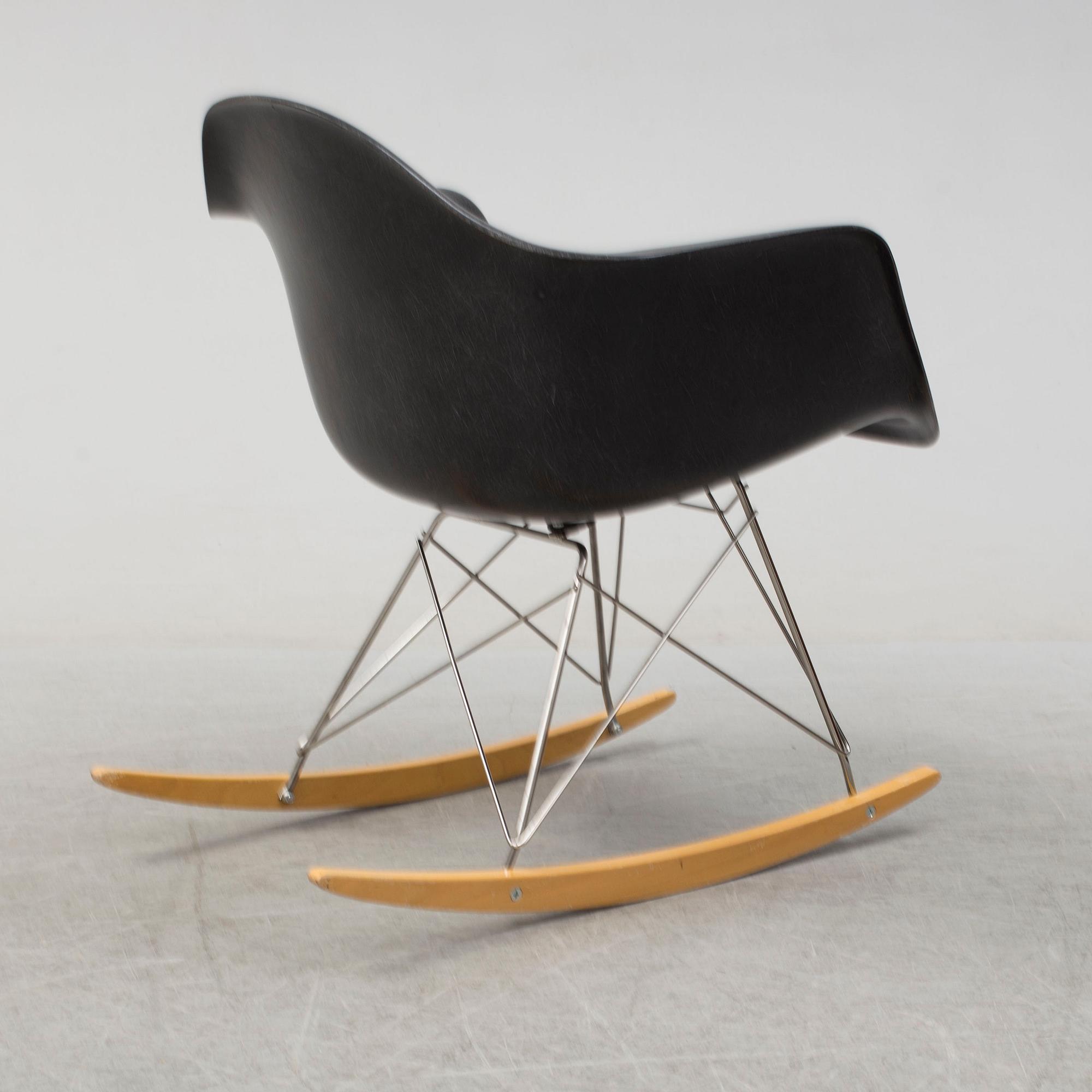 A 'Rocket chair' by Charles & Ray Eames, Herman Miller, late 20th century.