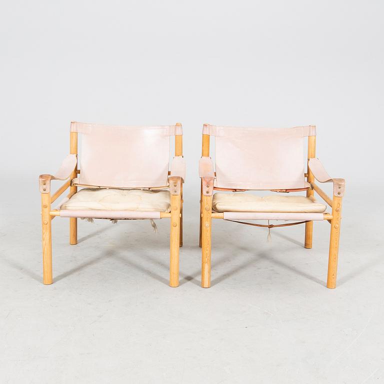 A pair of oak and leather 'Sirocco' easy chairs by Arne Norell for Norell Möbel AB, second half of the 20th century.