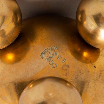 A pair of brass candlesticks from Gusum, circa 1900.