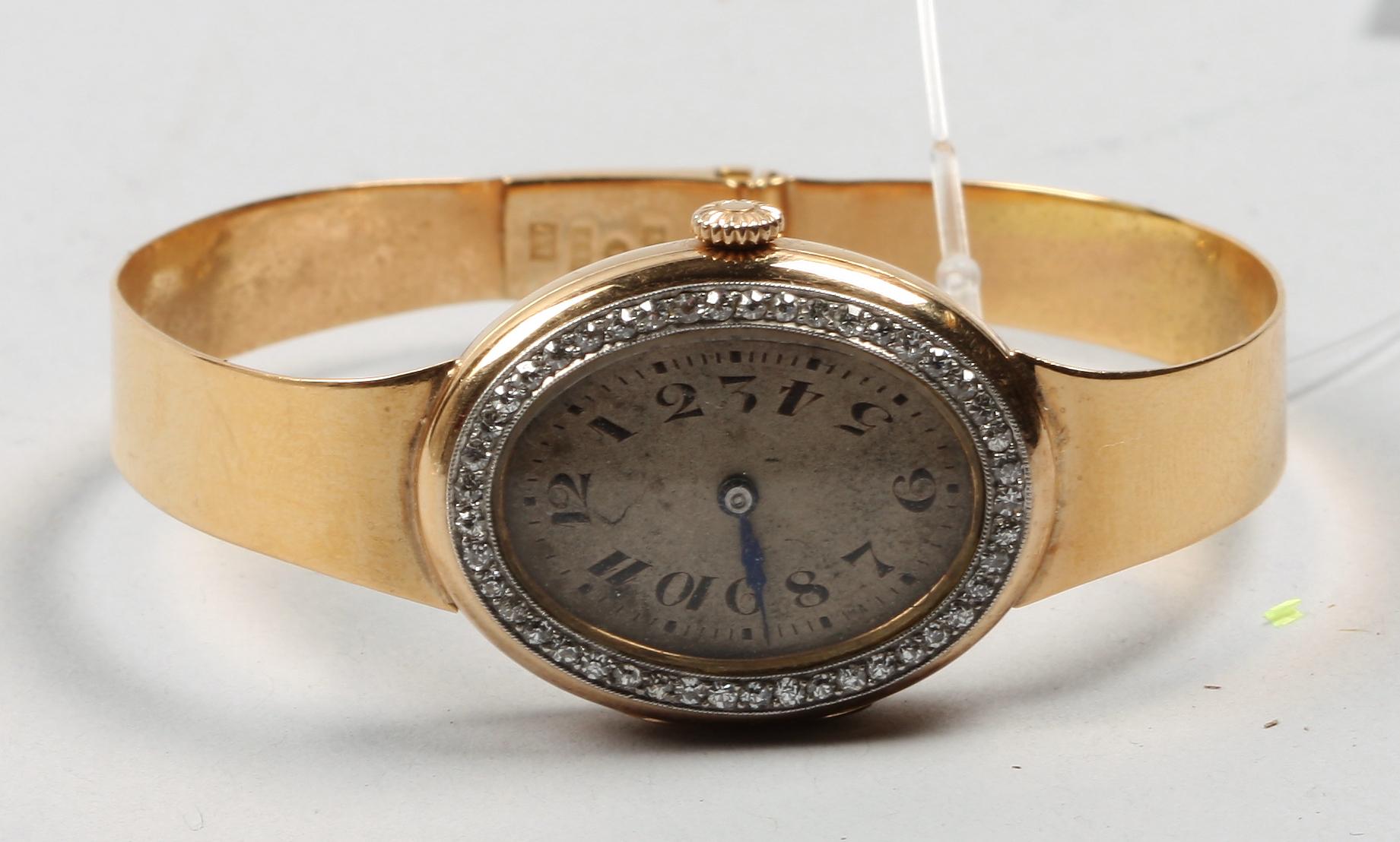 ARMBANDSUR, 18k guld.