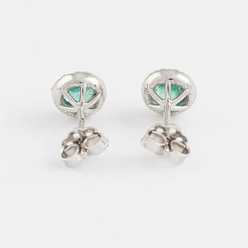 Emerald and brilliant cut diamond earrings.