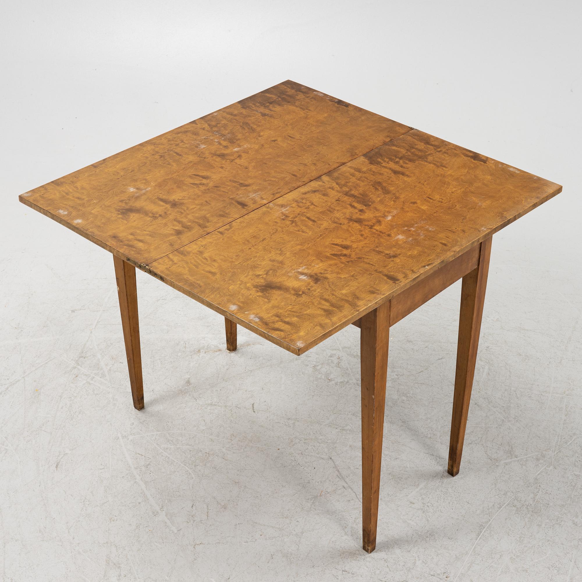 A birch card table, 20th Century.