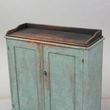 A mid 19th century painted cupboard.