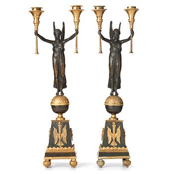 142. A pair of Empire-style 20th century candelabra.