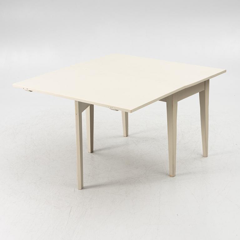 A drop-leaf table, late 19th century.