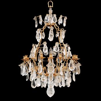 A late Baroque-style rock crystal twelve-light chandelier, circa 1900.