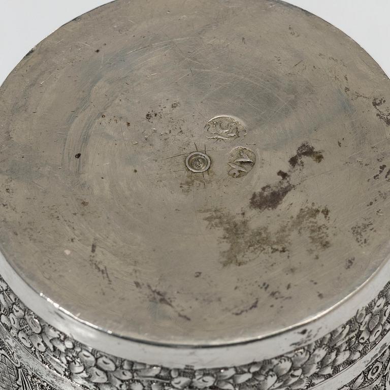 A Persian silver pitcher with five stemmed cups and a beaker, first part of the 1900s.