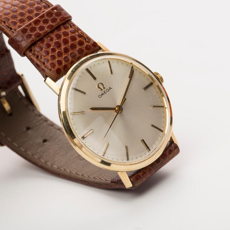 HERRARMBANDSUR, 14K guld. Manuellt, Omega, 1960-tal.