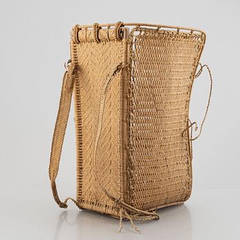 An Indonesian woven rattan backpack, 20th century.