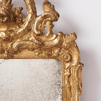 A giltwood rococo mirror by J. Åkerblad (master 1758-99).