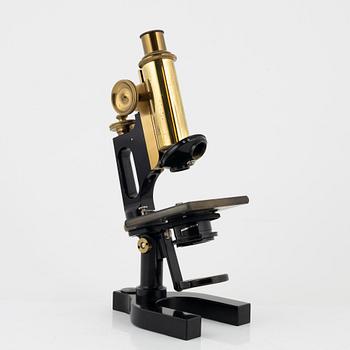A microscope with accessories, Bausch & Lomb Optical Co. Rochester N.Y, early 20th Century.