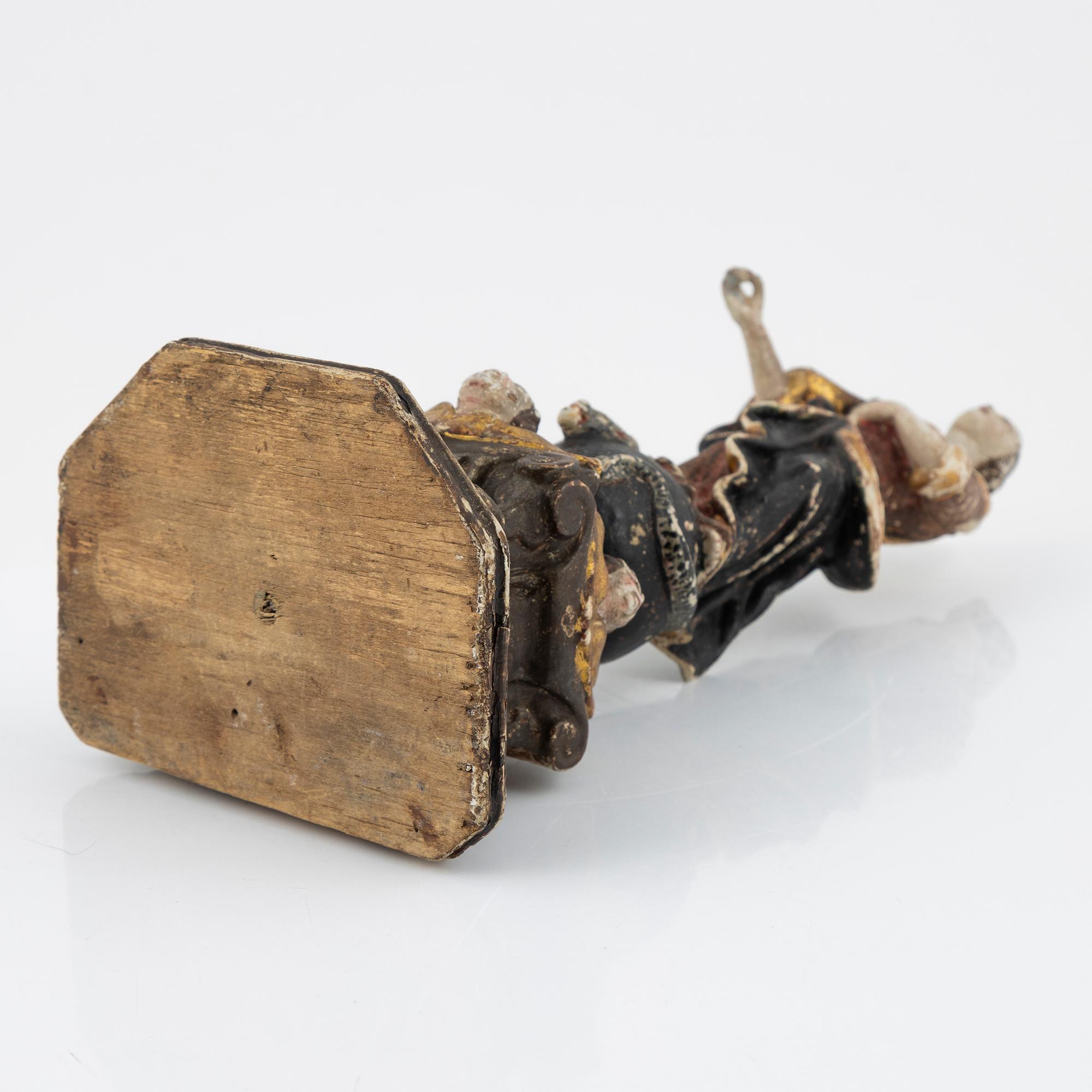 A carved and painted figure of the Virgin Mary crushing the Serpent, Southern Europe, 18th/19th century.