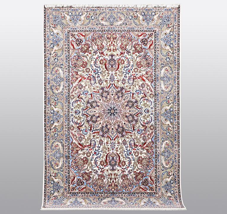 A carpet, Old Esfahan, part silk, ca 308 x 202 cm.