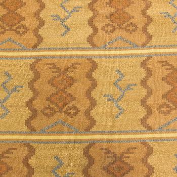 Aino Keinänen-Baeckmann, A 1920s Finnish flat weave carpet. Circa 300 x 203 cm.