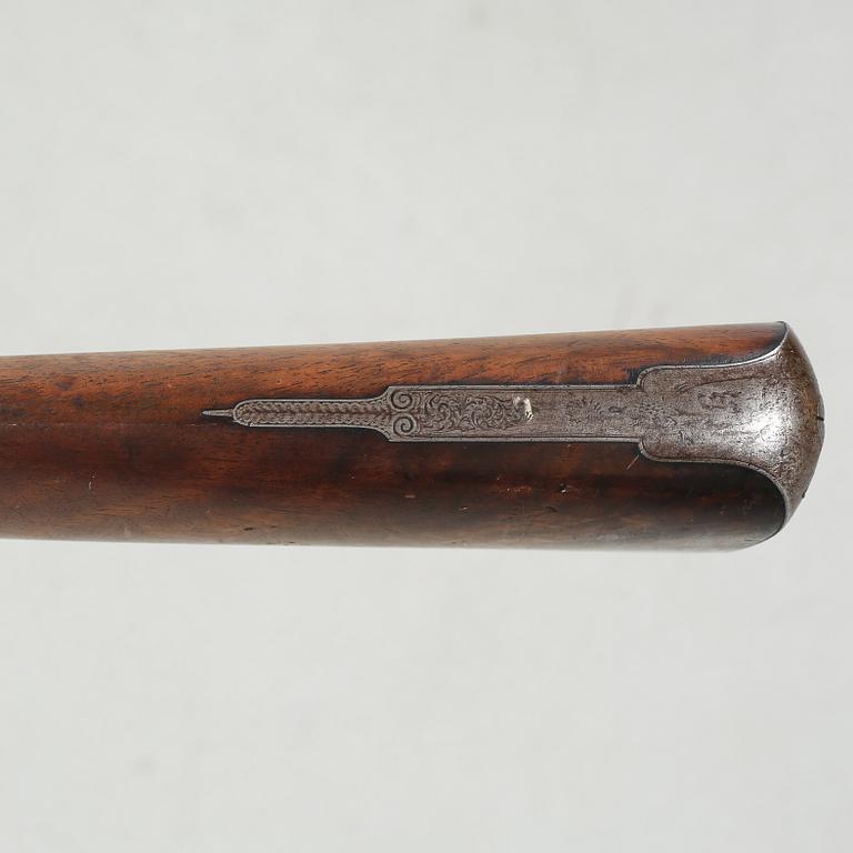A percussion rifle by Charles William Lanchester in London, around the mid 19th century.