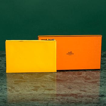 A WALLET by Hermes.