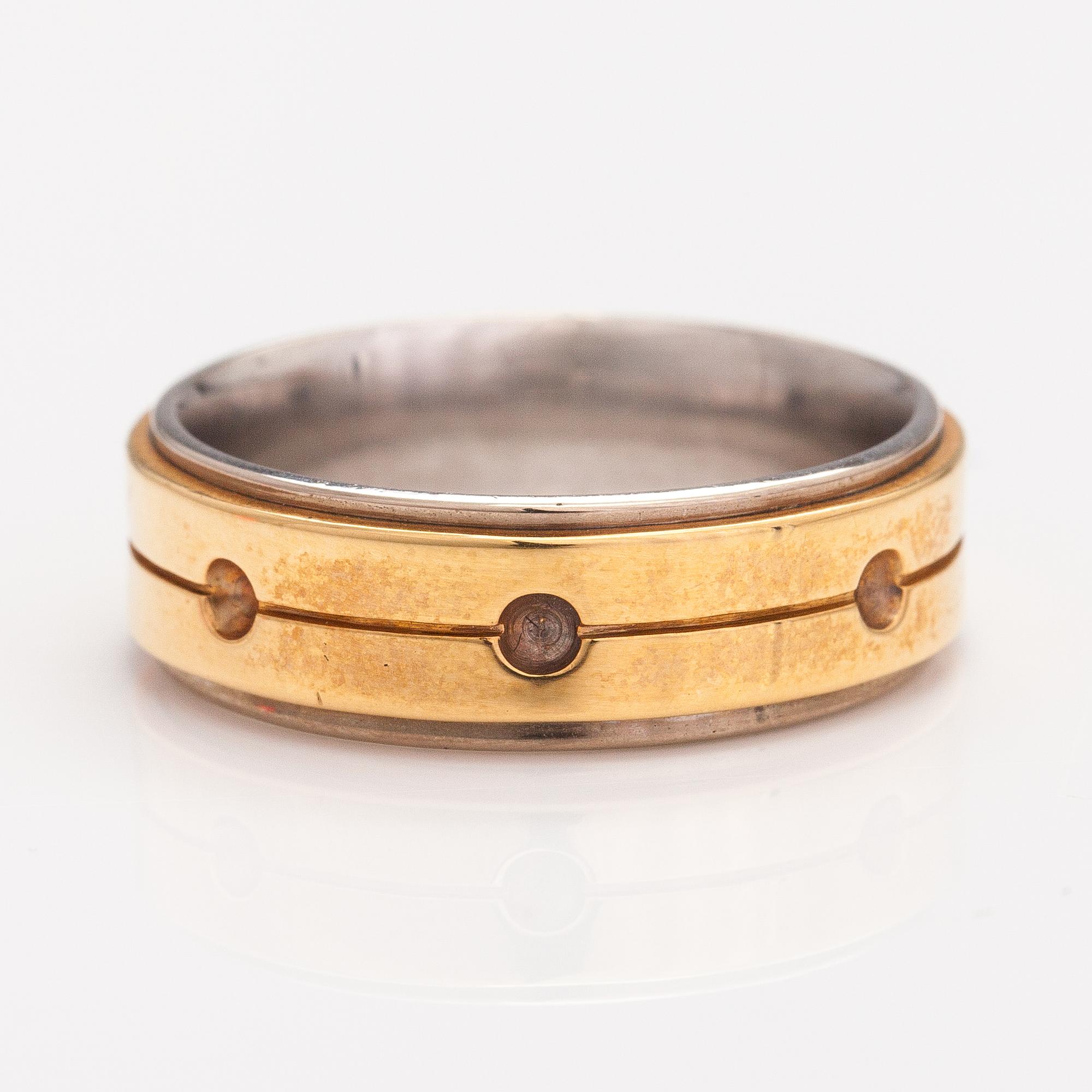 An 18K gold ring. Marski's.