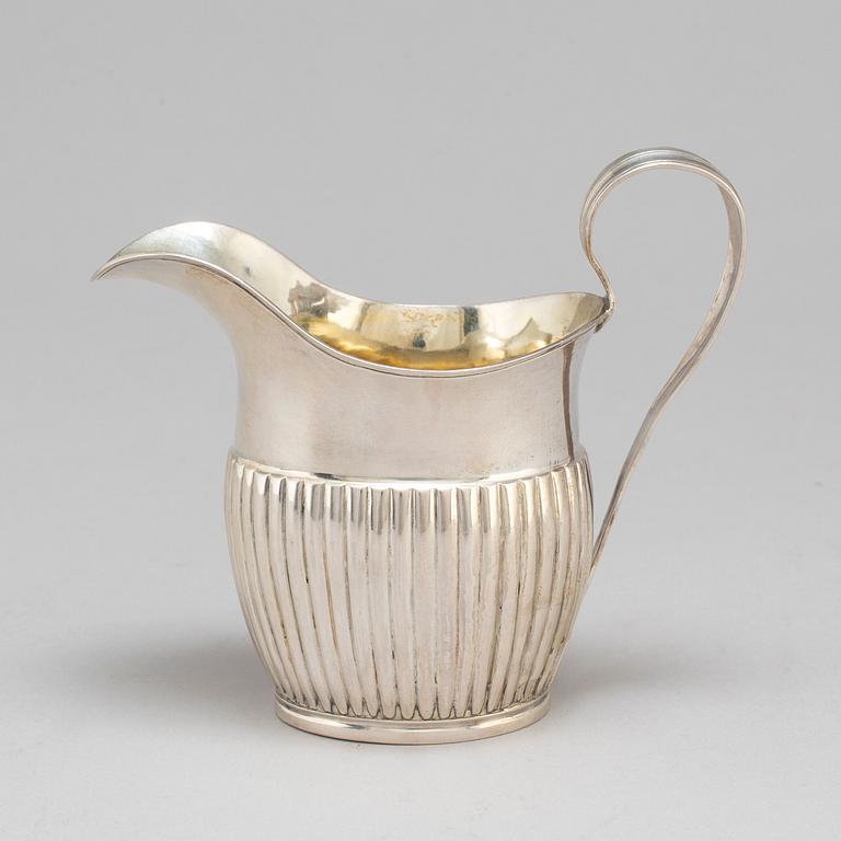 A silver creamer by JL Klint, Norrtälje 1828.