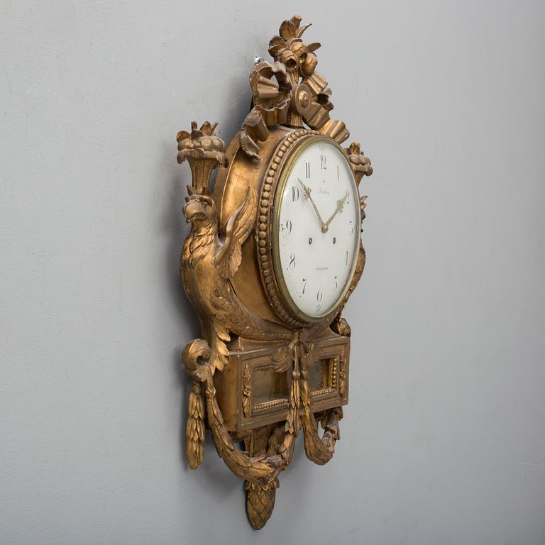 A late gustavian wall clock, signed Beurling, Stockholm. Late 18th / early 19th century.
