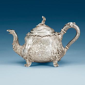 853. An English 19th century parcel-gilt tea-pot, marks of John Samuel Hunt, London 1849.
